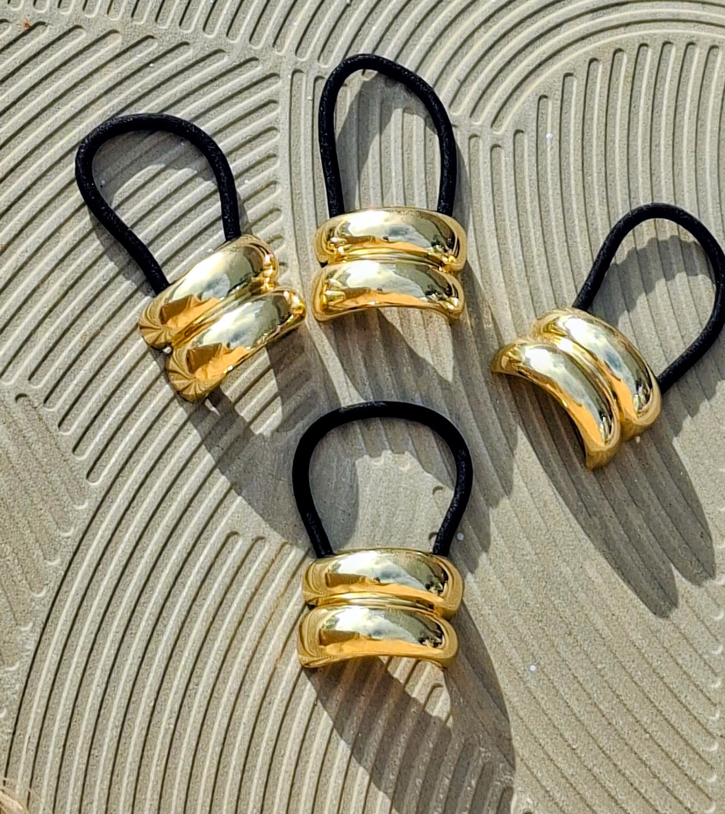 Golden cuff hair tie